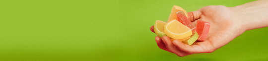 Hand holding gummy candy